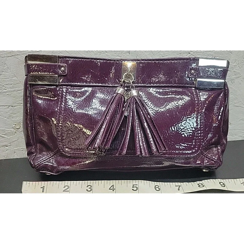 Victoria's Secret Cosmetic Bag Women Purple Vinyl Tasseled Clutch: Bag only‎